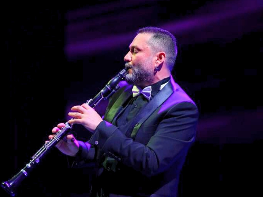 HÜSNÜ ŞENLENDİRİCİ